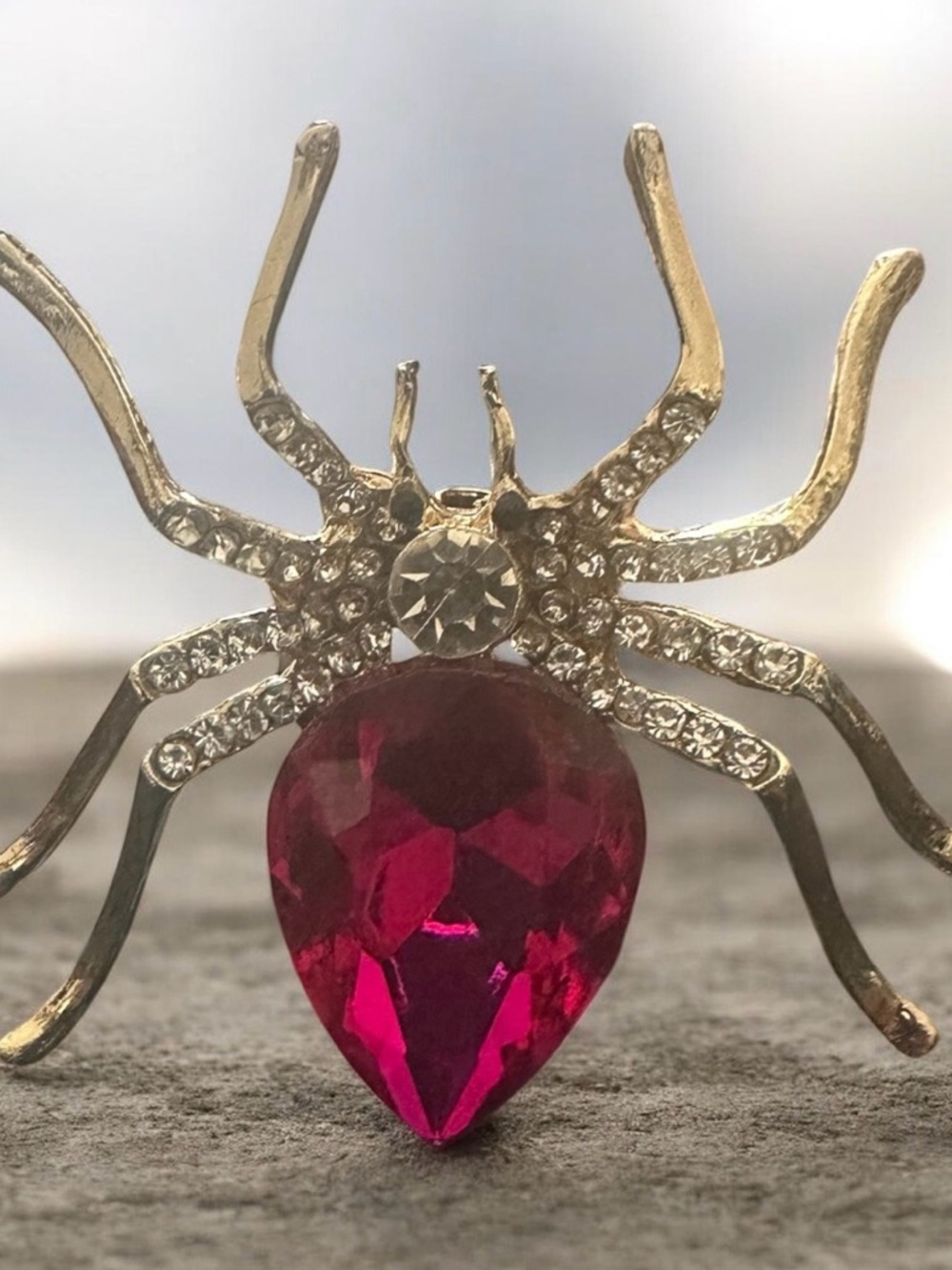 Gold-Tone Spider Brooch with Deep Pink Gem